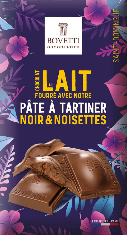 Tablette de chocolat au lait fourrée pâte à tartiner noir et noisette